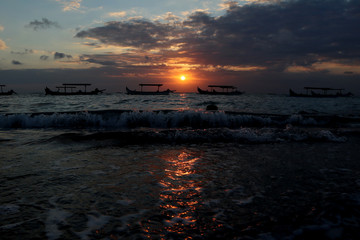 silhouette of traditional fishing boat