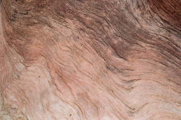 abstract close up of wavy pattern of slick rock