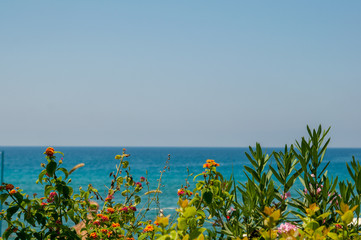Fototapeta na wymiar Alanya beach, beautiful place for rest, Sean and bright blue sky. Turkey wonderful landscape.