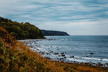 Coast line on the German island of Rügen near Cape Arkona with a cloudy sky