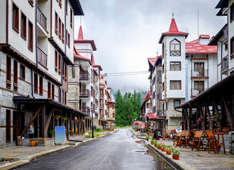 Mountain city with alpine architecture in rainy weather 2