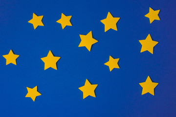 Yellow stars against the blue night sky. Application paper on the right. Copy space. Weather forecast concept