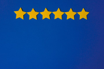 Yellow stars against the blue night sky. Application paper on the right. Copy space. Weather forecast concept