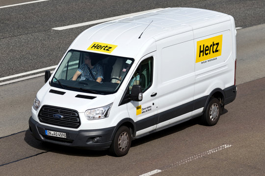 FRANKFURT AM MAIN, GERMANY - September 22, 2018: Ford Transit of Hertz on motorway. The Hertz Corporation is an American car rental company based in Estero, Florida.