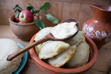 Fototapeta premium Traditional Food Concept. Lunch concept. Ukrainian dumplings. country style. copyspace