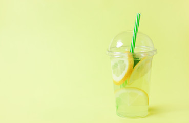 Lemonade or mojito cocktail with lemon and mint