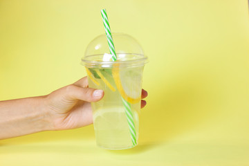 Lemonade or mojito cocktail with lemon and mint