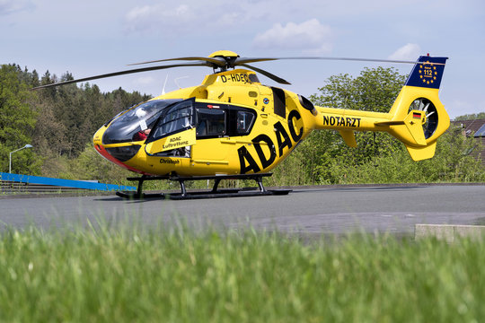 SIEGEN, GERMANY - April 22, 2018: ADAC Luftrettung rescue helicopter D-HDEC of type Eurocopter EC-135 P2.