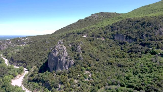 Aerial view of river in valley , Veria Greece, motion in front of a drone