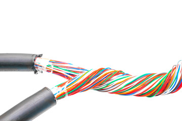 Two colored multi-core telephone cables intertwined. Mains internet connection wires are tightly closed. Node problems on telecommunications network. Communication wires isolated on white background.