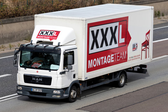 FRANKFURT AM MAIN, GERMANY - September 22, 2018: XXXL truck on motorway. Austria based XXXLutz is the second largest furniture retailer in the world.