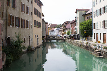 Fototapeta na wymiar Beautiful view of river and houses on a summer day. Annecy. France.