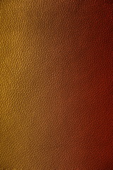 Texture of genuine leather. Gentle color leather texture closeup. Colorful background with gradient.