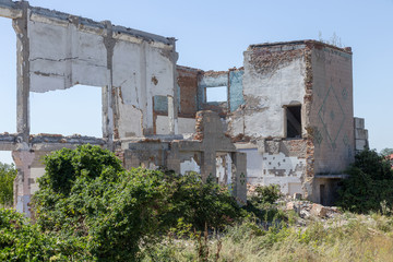 Ruined house. Remains of old houses. Apocalypse. Abandoned city. City of ghosts. Ruins of old...