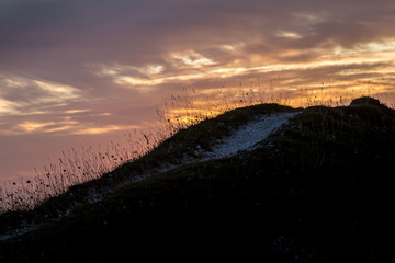 A chalk pathway on Ditchling Beacon in the South Downs, at sunrise
