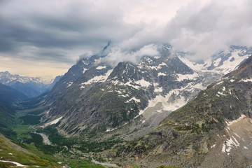 Fototapeta na wymiar View of mountain peaks with glaciers in Val Ferret, Aosta valley, Italy