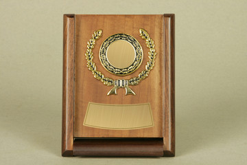 Various examples for awards or memorabilia. Award made of wood and precious metals.