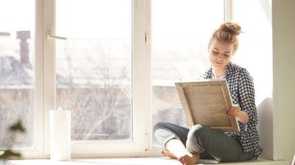 Young lovely girl spending time in art classes. girl showing master class, workout. Secret of beautiful painting