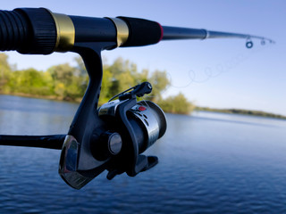 fishing on the river at sunset