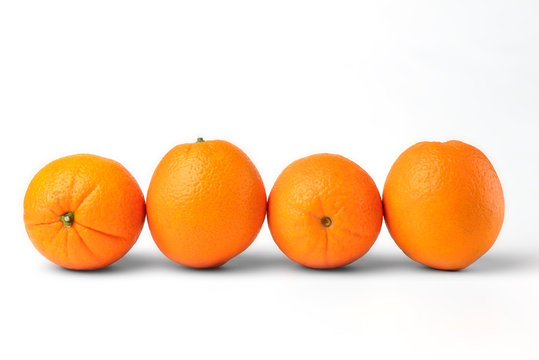 Juicy fresh oranges fruit isolated on white background