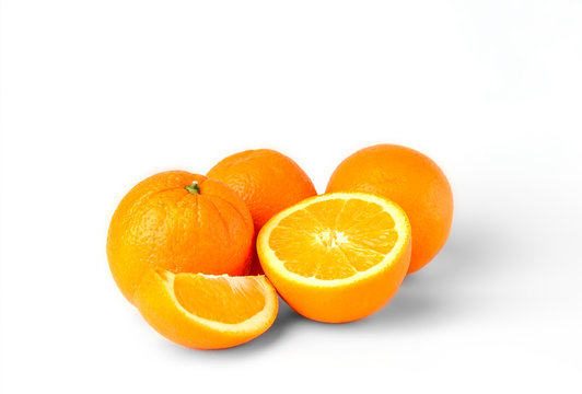Sliced oranges fruit segments isolated on white background