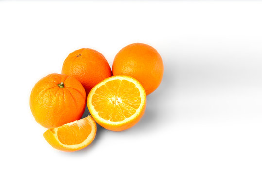 Sliced oranges fruit segments isolated on white background