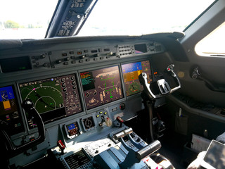 Bussenes jet airplane cockpit Flight Deck.Instrument panel.