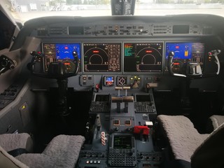 Bussenes jet airplane cockpit Flight Deck.Instrument panel.