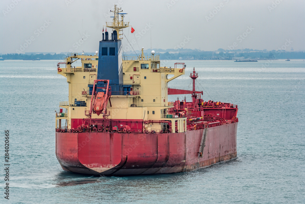 Canvas Prints A stern view of Chemical/Oil Products tanker underway in coastal zone near Singapore.