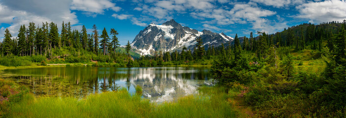 Picture Lake with Mt. Shuksan, Washington state. Picture Lake is the centerpiece of a strikingly beautiful landscape in the Heather Meadows area of the Mt. Baker-Snoqualmie National Forest. - 284021487