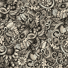 Cartoon hand-drawn doodles on the subject of Autumn theme seamless pattern