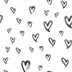 Heart doodles seamless love pattern. Hand drawn brushed hearts. Background texture for valentine's day.