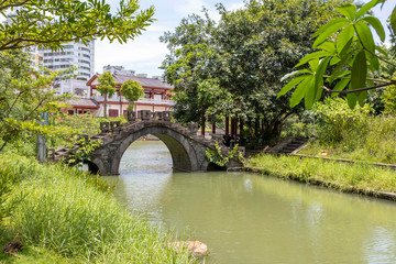 Fototapeta na wymiar bridge over the river Wugong Temple, Haikoy, Hainan, China