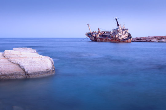 Abandoned rusty ship Edro III near Pegeia, Paphos, Cyprus at sunrise