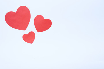 Obraz na płótnie Canvas St. Valentine's Day. Heart cut out of paper on white background.
