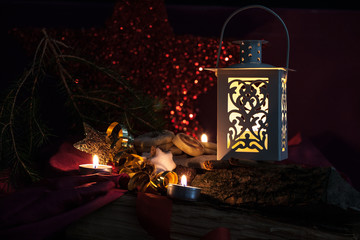Christmas Background Concepts with .Lantern, candles and cookies