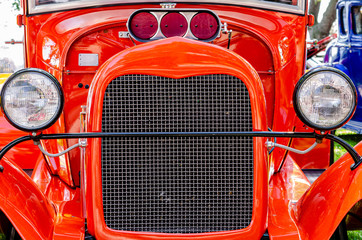 Front view of a red hot rod