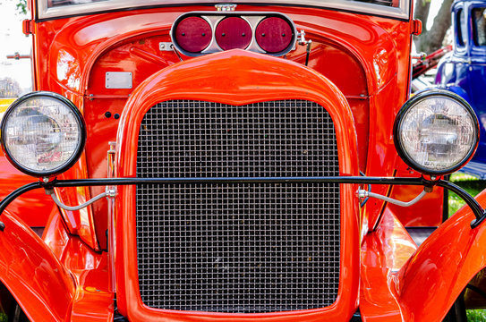 Front View Of A Red Hot Rod