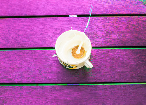 cup of milk and a buiscuit 