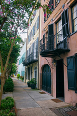 Fototapeta na wymiar Scenic street view of the Georgian architecture of Rainbow Row in the Battery, Charleston, South Carolina, USA