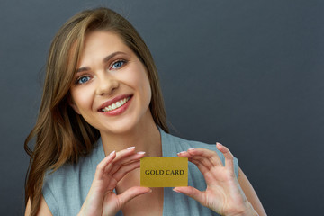 happy woman holding credit card.
