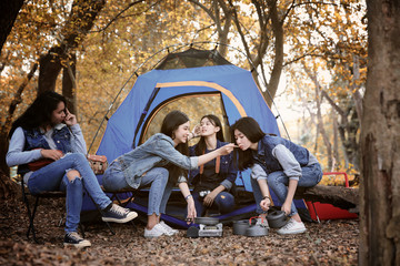 Woman group make camping in forest