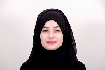 Naklejka premium Portrait of muslim girl, muslim woman wear black scarf and dress, Islamic wear fashion concept photo