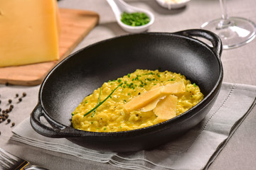 Traditional Italian pasta on black rustic pan