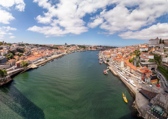 View of the historic city of Porto, Portugal in the right side of Douro river and Vila Nova de Gaia...
