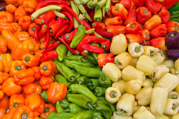 top view flat lay of various peppers on table at Farmers Market.