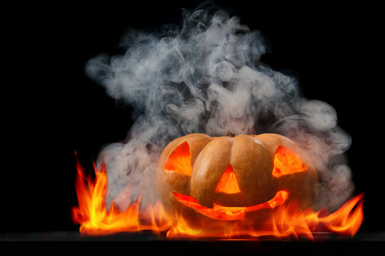 Halloween pumpkin with smoke.