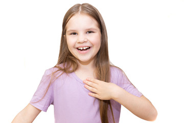 The little girl does not know what to do, and widely scatters hands. It is isolated on a white background.