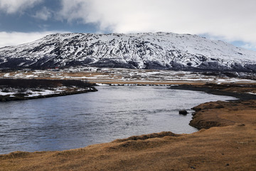 Natural background of big mountain and river in Iceland. travel and nature concept.