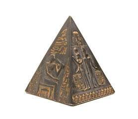 pyramid figurine stands on a white background